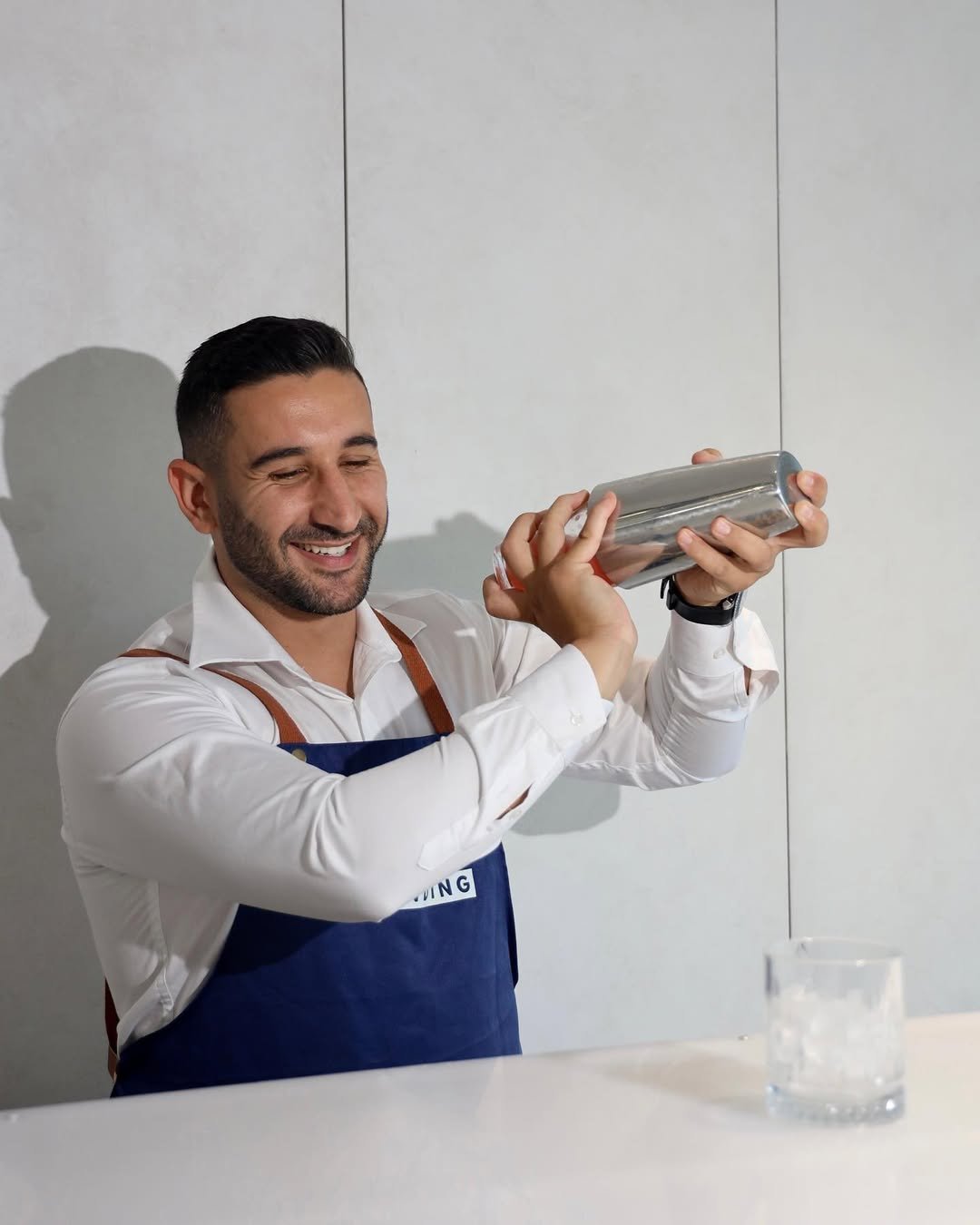 Shot Bartending bartender shaking a cocktail
